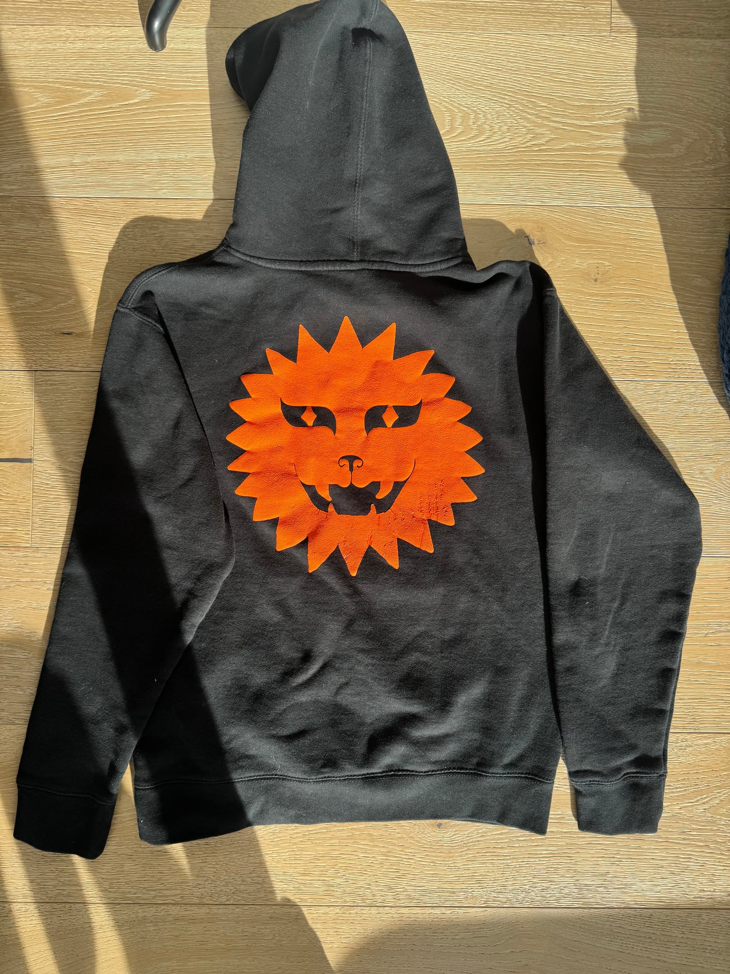 Orange Puff Sun Lion on Black Hoodie (Sample)